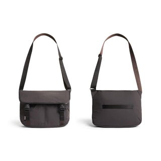 Bellroy Cinch Messenger Bag in dark recycled nylon with front flap and adjustable shoulder strap shown front and back