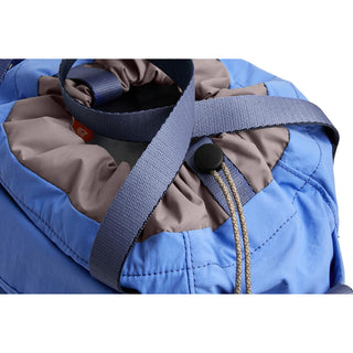 Bellroy Cinch Bucket Bag in blue with adjustable straps and drawstring closure detail