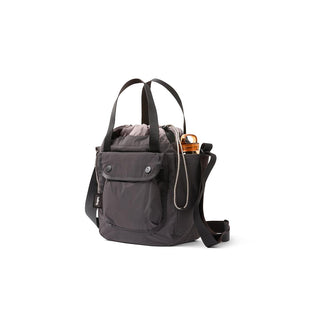 Bellroy Cinch Bucket Bag in charcoal recycled nylon with external pocket and adjustable strap