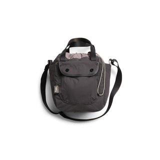 Bellroy Cinch Bucket Bag in charcoal gray with adjustable strap and front snap pocket detail