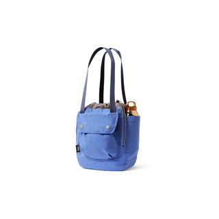 Bellroy Cinch Tote in blue recycled nylon with front pocket and long shoulder straps