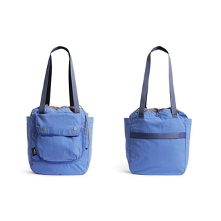 Bellroy Cinch Tote in blue recycled nylon showing front flap pocket and rear zip compartment