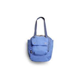 Bellroy Cinch Tote in blue recycled nylon with front flap pocket and long shoulder straps