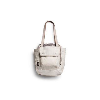 Bellroy Cinch Tote in light beige with front flap pocket and durable recycled nylon fabric