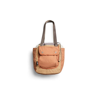 Bellroy Cinch Tote in tan and beige with front pocket and long shoulder straps made from recycled fabric