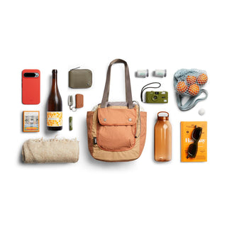 Bellroy Cinch Tote in tan with dual shades, featuring durable recycled nylon fabric and front flap pocket