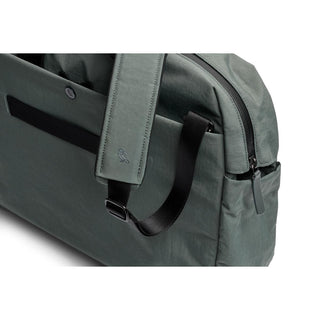 Bellroy Tokyo Work Bag in muted green with padded strap and durable zipper closure detail