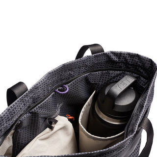 Bellroy Lite Totepack open top showing textured recycled fabric and organized interior pockets with water bottle holder