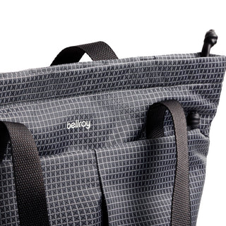 Bellroy Lite Totepack in black grid-patterned recycled fabric with dual black handles and subtle logo detail