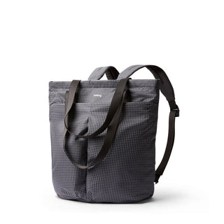 Bellroy Lite Totepack in charcoal with textured fabric and black adjustable straps shown at slight angle