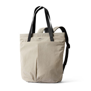 Bellroy Lite Totepack in beige recycled nylon with black straps and spacious exterior pocket design
