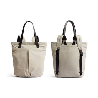Bellroy Lite Totepack in light beige with black straps shown front and back views made from recycled nylon