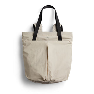 Bellroy Lite Totepack in light beige with black straps made from recycled nylon fabric