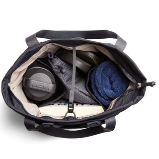 Bellroy Lite Totepack open view showing interior with gym towel, water bottle, and organizer pouch