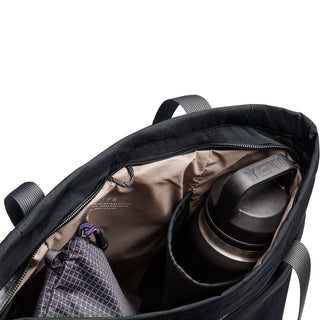 Bellroy Lite Totepack showing spacious interior with water bottle pocket and organized storage compartments