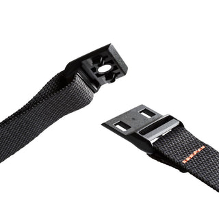 Close-up of black adjustable strap and buckle from Bellroy Lite Sling bag showing textured fabric and stitching details