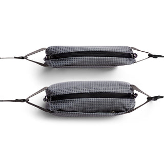 Bellroy Lite Sling Mini in gray textured fabric with black zipper and adjustable straps shown from above