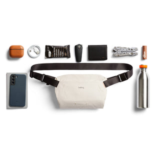 Bellroy Lite Sling Mini beige crossbody bag with adjustable strap and minimalist design