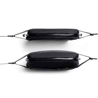 Bellroy Lite Sling Mini in black from side view showing slim, water-resistant recycled material structure