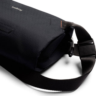 Bellroy Lite Sling Mini black crossbody bag with textured fabric and adjustable strap detail