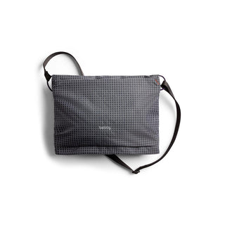 Bellroy Lite Sacoche crossbody bag in black with grid pattern made from recycled fabric materials