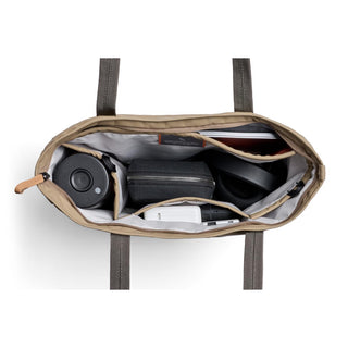 Bellroy Tokyo Tote Compact showing organized compartments with tech and accessories inside beige fabric
