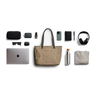 Bellroy Tokyo Tote Compact in tan woven recycled fabric with organized daily essentials around it