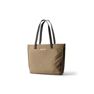 Bellroy Tokyo Tote Second Edition in tan water-resistant fabric with black handles, side view isolated on white