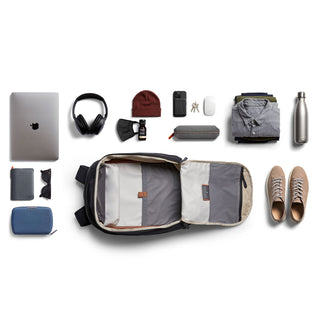 Bellroy Transit Workpack 20L open showing organized interior with everyday carry items around