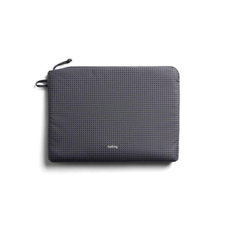 Bellroy Lite Laptop Sleeve 14 inches with dark grid-patterned recycled fabric and zipper closure