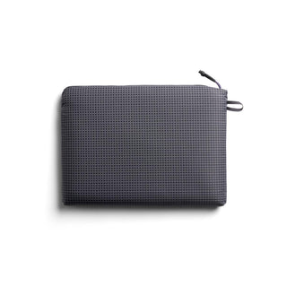 Bellroy Lite Laptop Sleeve 14" in dark gray eco fabric with textured grid pattern and zipper closure