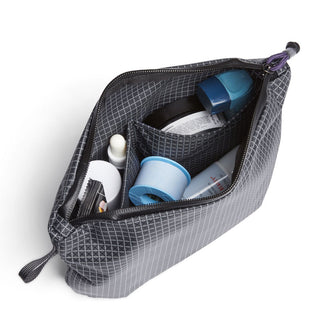 Bellroy Lite Pouch Duo in gray recycled nylon with organized compartments holding personal items