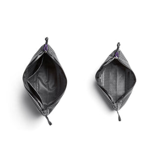 Bellroy Lite Pouch Duo showing interior compartments and textured recycled nylon fabric in dark gray
