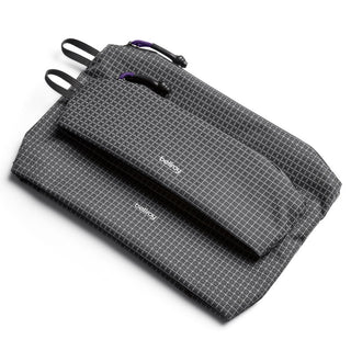 Bellroy Lite Pouch Duo in charcoal grid pattern with durable recycled nylon and zipper pull details