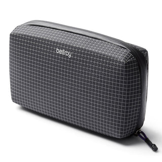 Bellroy Tech Kit compact black grid-patterned tech organizer with durable fabric and zip closure
