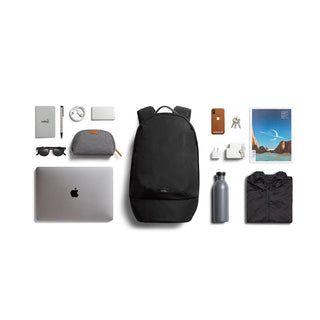 Bellroy Classic Backpack Second Edition in black with textured recycled fabric and front zip pocket shown with essentials