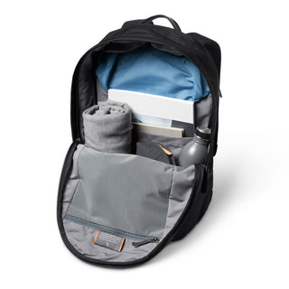 Bellroy Classic Backpack Plus Second Edition open with organized blue fabric and essentials inside