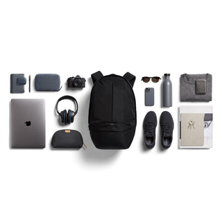 Bellroy Classic Backpack Plus Second Edition in black with daily essentials laid out around it on white background