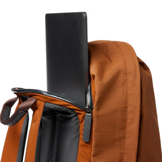 Bellroy Classic Backpack Plus Second Edition in burnt orange, open with laptop compartment visible