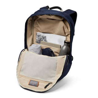 Bellroy Classic Backpack Plus Second Edition in navy showing organized interior with water bottle and personal items
