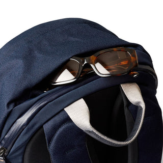 Bellroy Classic Backpack Plus Second Edition navy fabric with sunglasses tucked in top zipper pocket