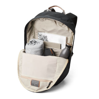Bellroy Classic Backpack Plus Second Edition open showing organized beige interior and outdoor essentials