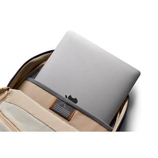 Bellroy Via Backpack open showing padded laptop compartment with grey trim and beige interior lining