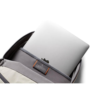 Bellroy Via Backpack with padded laptop sleeve holding a silver laptop inside soft recycled fabric lining