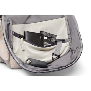 Bellroy Via Backpack interior pocket showing organized essentials including key holder and card holder