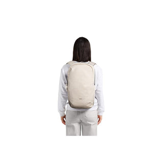 Bellroy Via Backpack worn on back showing streamlined light beige recycled fabric design