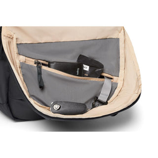 Bellroy Via Backpack interior compartments showing organized storage with light beige and grey lining