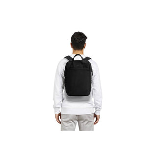 Bellroy Via Workpack black backpack worn on back showing slim, rectangular shape with padded straps