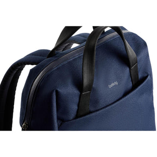 Bellroy Via Workpack navy blue backpack with black handles and textured recycled fabric details
