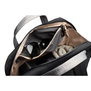 Bellroy Via Workpack black backpack showing organized interior with sunglasses and knitwear pockets